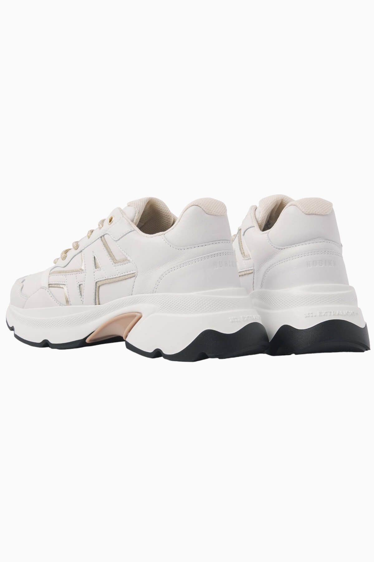 Nubikk Ross Trek white sneaker from the back, highlighting the heel and chunky white-and-black sole.